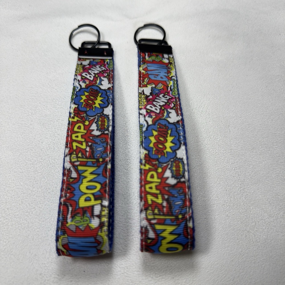 2 Super Here Comics Key Chain, Colorful, 1" Wide 6" Long. 12" Round